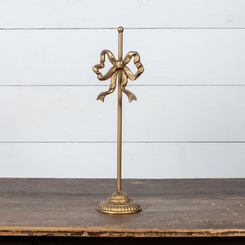 GOLD WREATH STAND W/ BOW